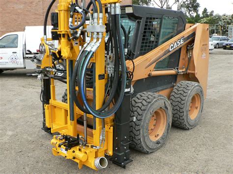 core drill for skid steer|skid steer drilling attachment.